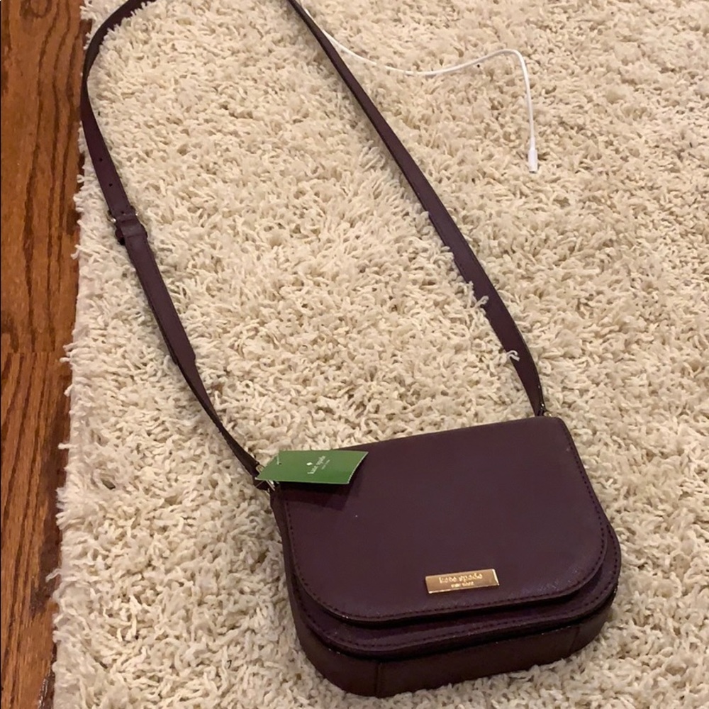 Small wine color Kate spade crossbody